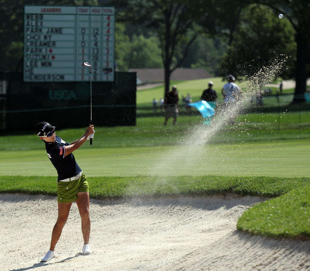 Hyo Joo Kim, hits out of the bunker on the 14th hole, during second day action of the 70th US Women's Open at Lancaster Country Club Friday July 10, 2015. (Photo/Chris Knight)