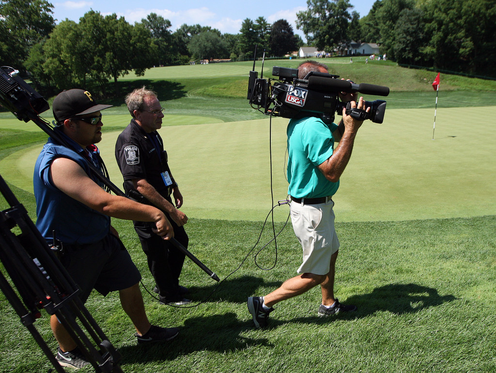 A Fox Sports camera crew follows Shiho Oyama, and Marina Alex, during third day action of the 70th US Women's Open at Lancaster Country Club Saturday July 11, 2015. (Photo/Chris Knight)