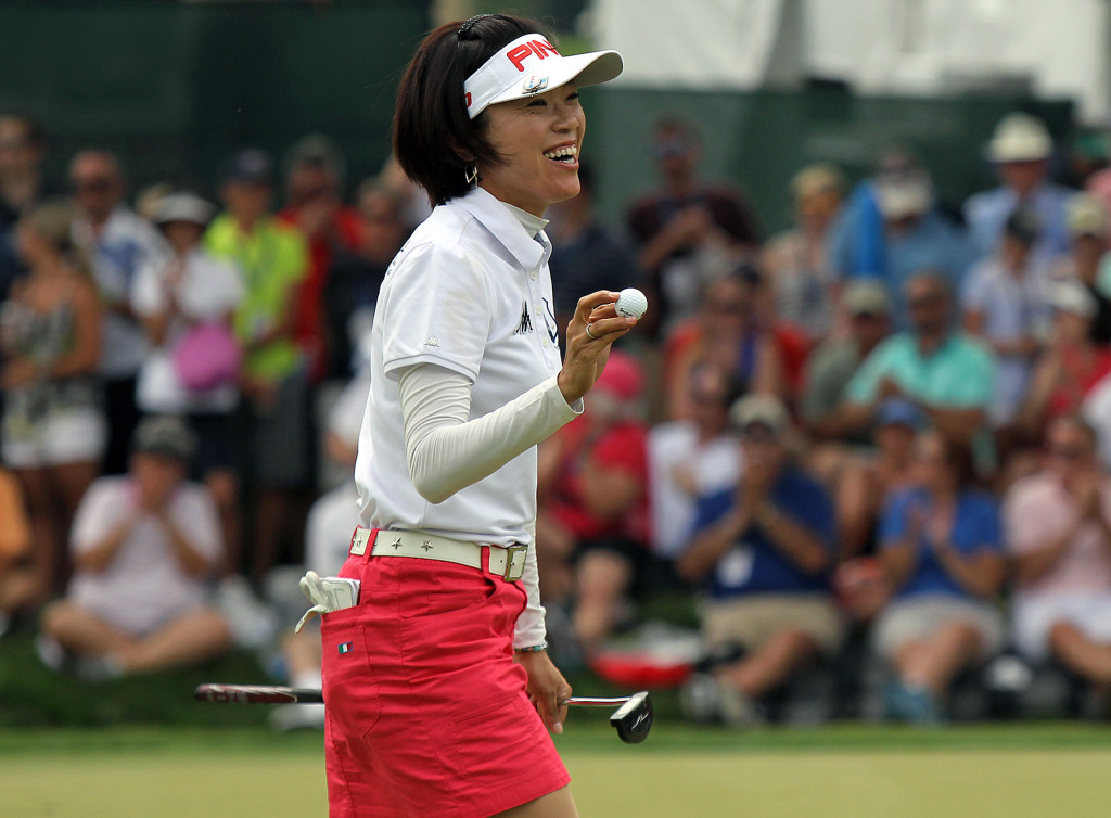 Shiho Oyama, acknowledges the crowd after a birdie on the 6th hole, during final day action of the 70th US Women's Open at Lancaster Country Club Sunday July 12, 2015. (Photo/Chris Knight)