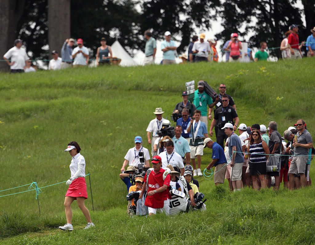 Shiho Oyama, left, makes her way down the hill after teeing off on the 3rd hole, during final day action of the 70th US Women's Open at Lancaster Country Club Sunday July 12, 2015. (Photo/Chris Knight)