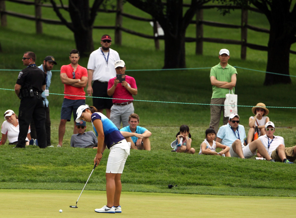 In Gee Chun, putts on the 4th hole, during final day action of the 70th US Women's Open at Lancaster Country Club Sunday July 12, 2015. (Photo/Chris Knight)