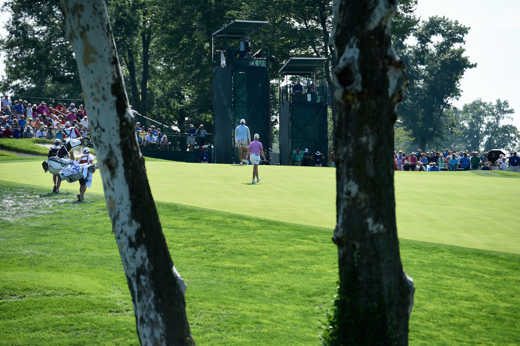 With a sycamore as a scene setter, Shanshan Feng and Karrie Webb approach the eighth green during the second round of the US Women's Open at Lancaster Country Club on Friday, July 10, 2015. (Photo/Suzette Wenger)
