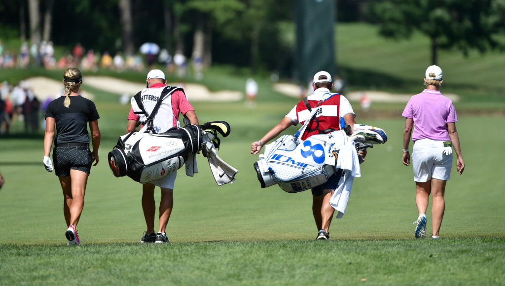 A good walk was taken on the seventh fairway by Suzann Petersen and Karrie Webb long with their caddies during the second round of the US Women's Open at Lancaster Country Club on Friday, July 10, 2015. (Photo/Suzette Wenger)