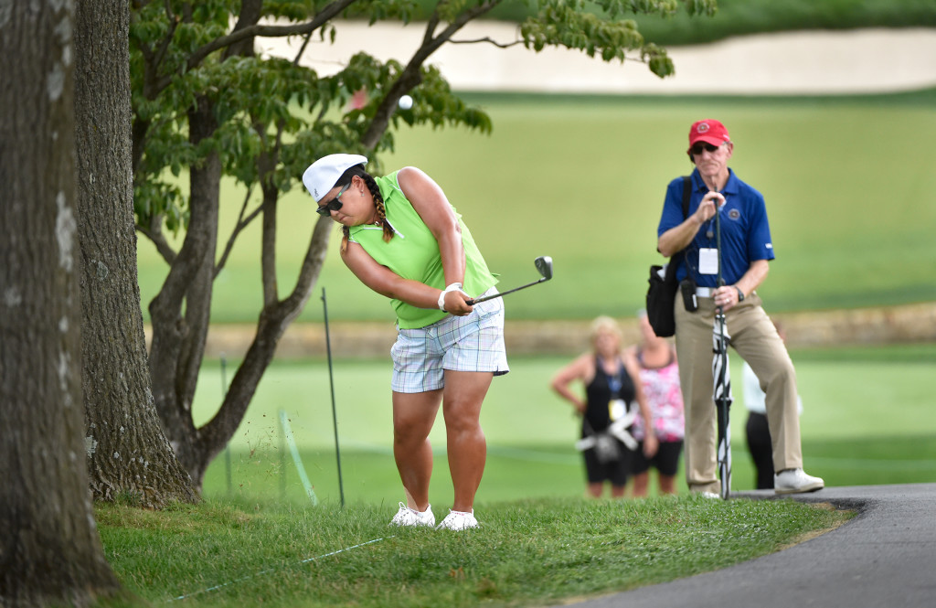 Christina Kim hits a pitch shot that was close to a tree trunk on the eighth hole during the opening round of the US Women's Open at Lancaster Country Club on Thursday, July 9, 2015. (Photo/Suzette Wenger)