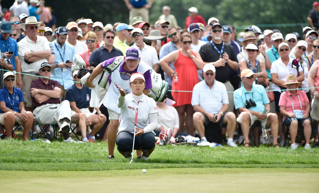 Amy Yang and David Poitevent read a putt on the eighth hole during the final round of the US Women's Open at Lancaster Country Club on Sunday, July 12, 2015. (Photo/Suzette Wenger)