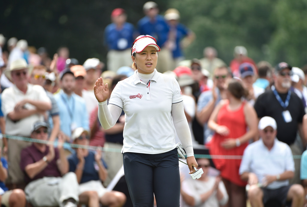 Amy Yang acknowledges the crowd after a putt on the eighth hole during the final round of the US Women's Open at Lancaster Country Club on Sunday, July 12, 2015. (Photo/Suzette Wenger)