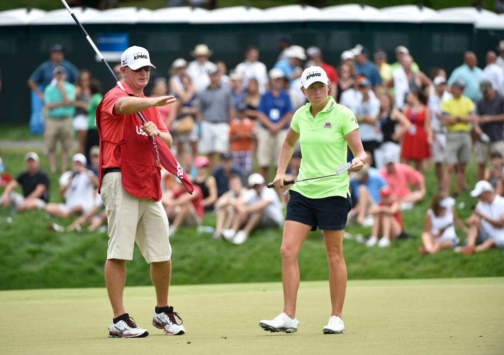 Travis Wilson and Stacy Lewis look over her putt on the sixth green during the final round of the US Women's Open at Lancaster Country Club on Sunday, July 12, 2015. (Photo/Suzette Wenger)