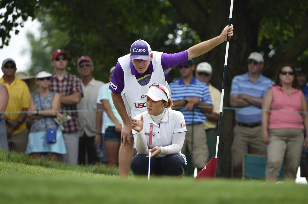 Amy Yang and her caddie David Poitevent, talk about the break of her putt on the third hole during the final round of the US Women's Open at Lancaster Country Club on Sunday, July 12, 2015. (Photo/Suzette Wenger)