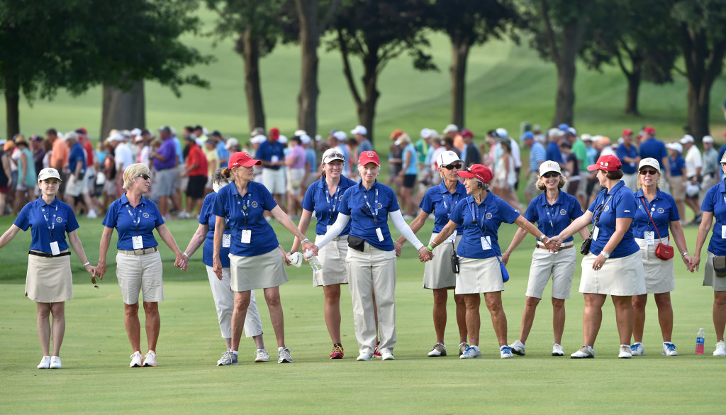 Ladies hold hands on the 18th fairway as the final round of the US Women's Open at Lancaster Country Club concludes on Sunday, July 12, 2015. (Photo/Suzette Wenger)