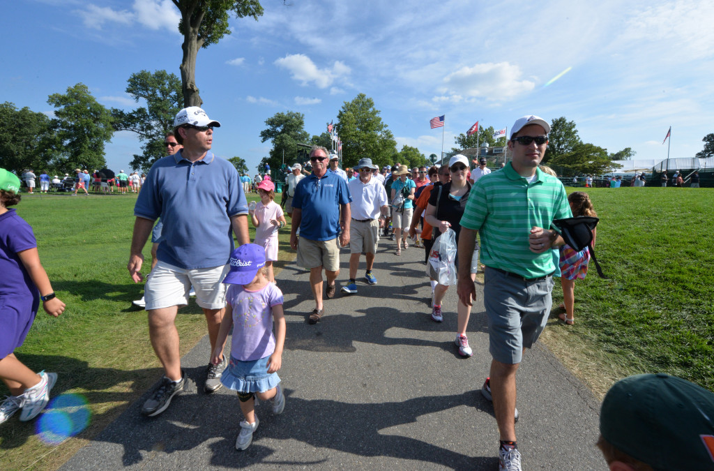 Fans make their way between holes at Lancaster Country Club as they watch the second round of the 2015 U.S. Women's Open Friday.  (Photo/Blaine Shahan)