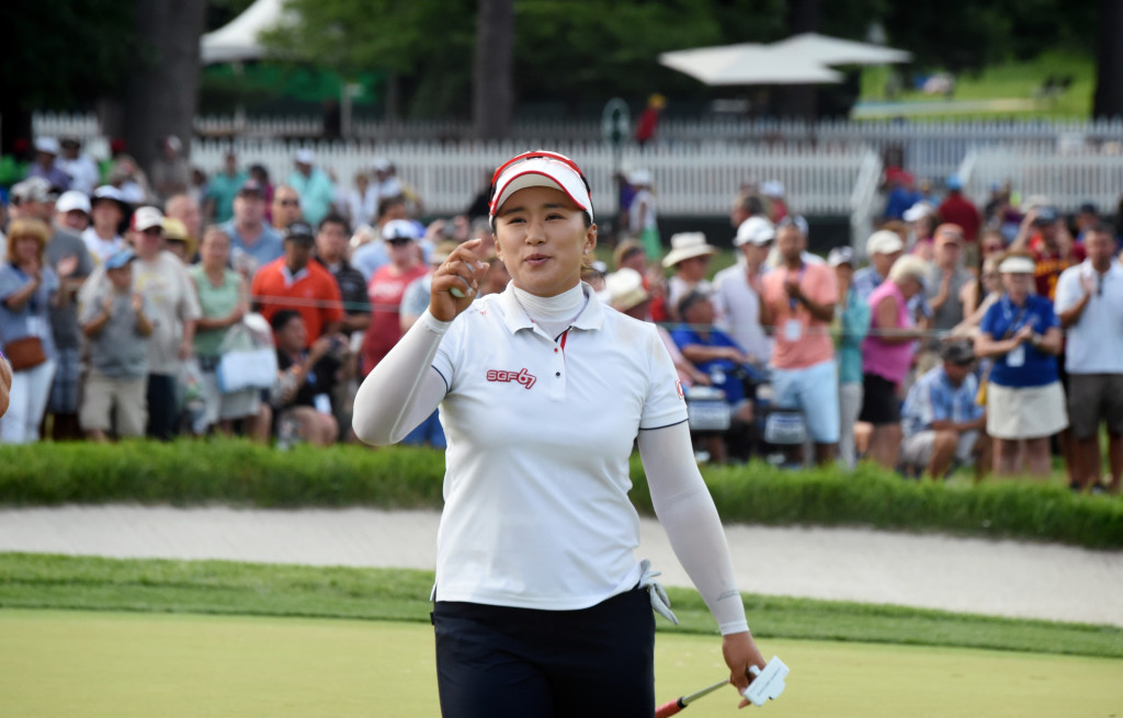 Amy Yang waves to the crowd after finisher the final round of the 2015 U.S. Open with a bogey 18 to finish second.