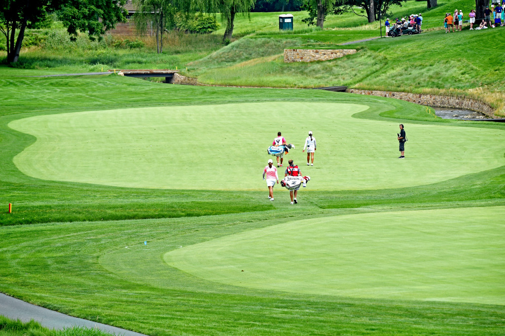 Mi Hyang Lee and Inbee Park and their caddies walk the #4 fairway at Lancaster Country Club on Round 4 of the U.S. Women's open Sunday. (Photo/Blaine Shahan)