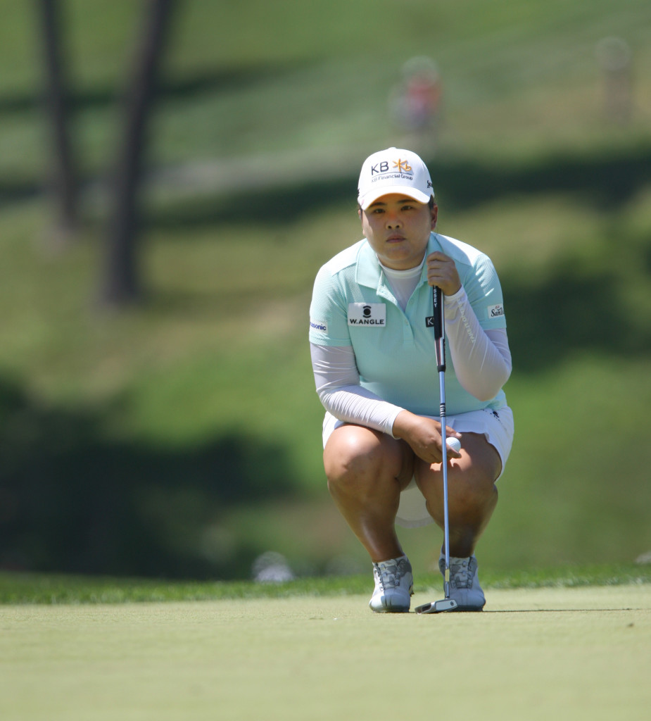 Inbee Park eyes up a putt on the third hole during the third round of play in the U.S. Women's Open at the Lancaster Country Club in Lancaster on Saturday, July 11, 2015. (Photo/Vinny Tennis)