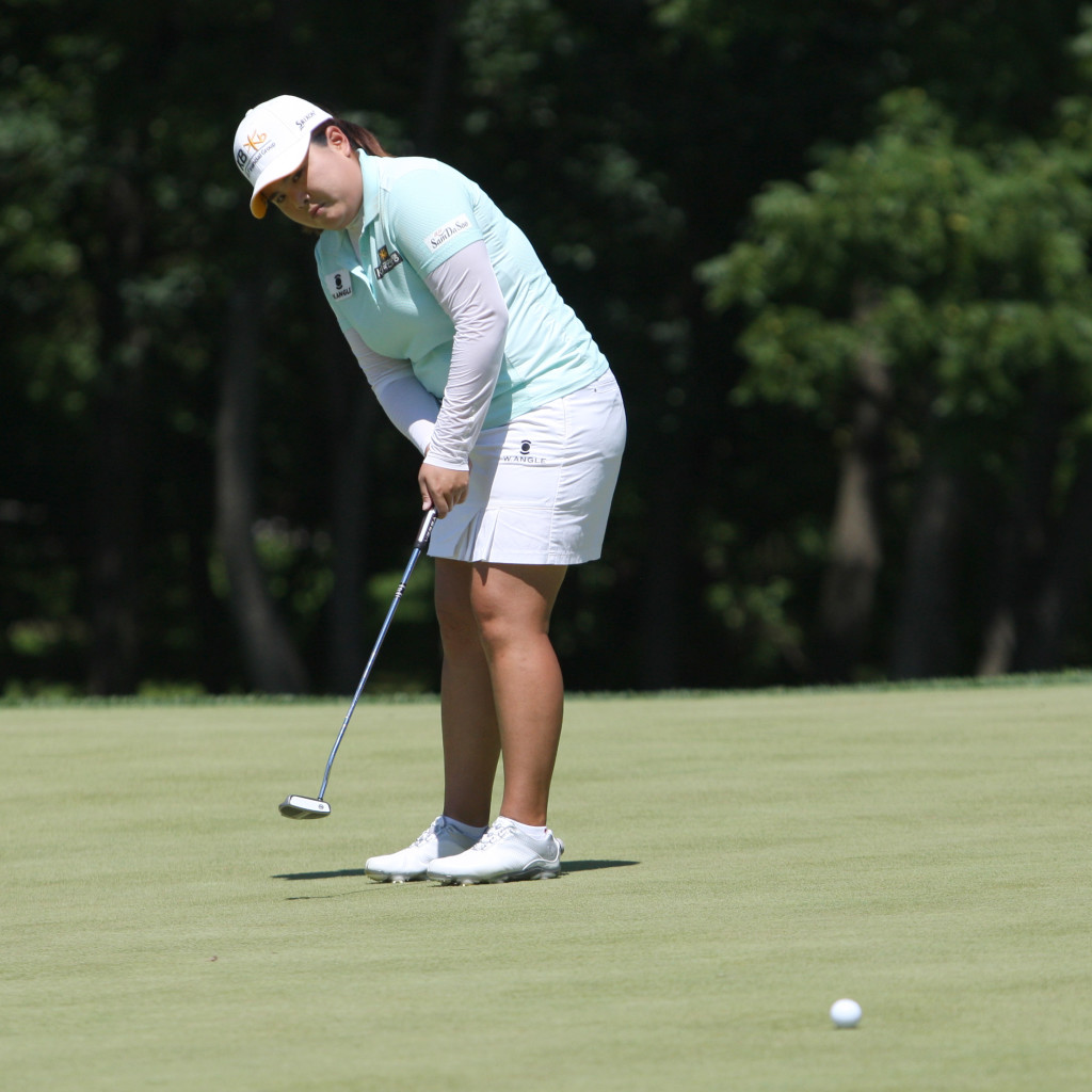 Inbee Park putts on the third hole during the third round of play in the U.S. Women's Open at the Lancaster Country Club in Lancaster on Saturday, July 11, 2015. (Photo/Vinny Tennis)