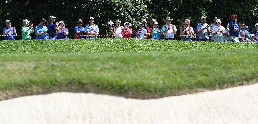 Spectators watch play the eighth hole during the third round of play in the U.S. Women's Open at the Lancaster Country Club in Lancaster on Saturday, July 11, 2015. (Photo/Vinny Tennis)